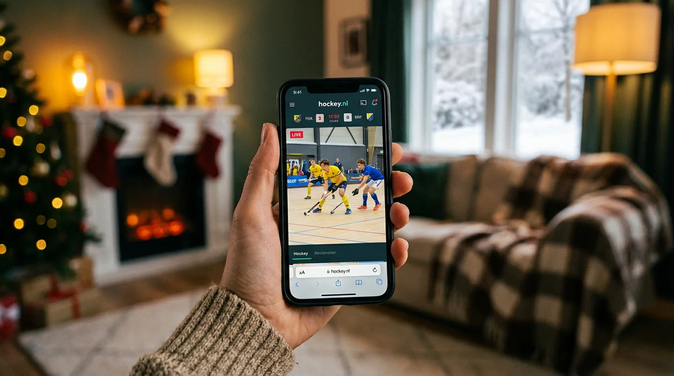 Smartphone die een zaalhockey livestream toont via de hockey.nl app